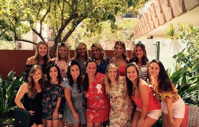 A group of females posing in front of the camera during a bachelorette party